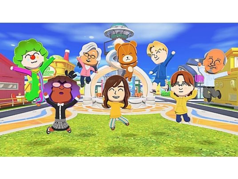 Portada oficial del juego Tomodachi Life Una Vida de Ensueño para Nintendo Switch, mostrando un collage de personajes Mii felices en una isla tropical colorida.